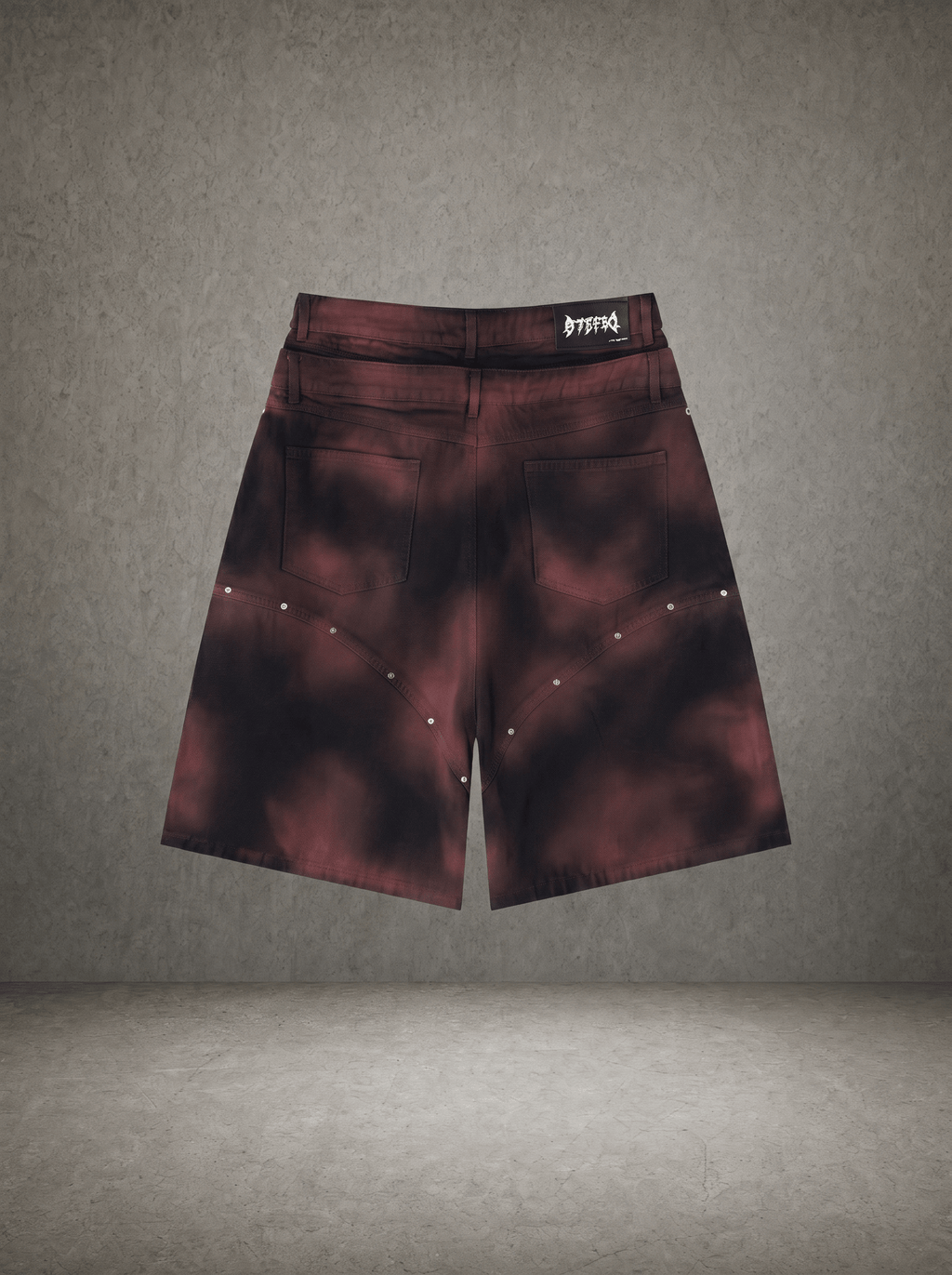 GOTHIC TRIBAL SPIKED DENIM SHORTS