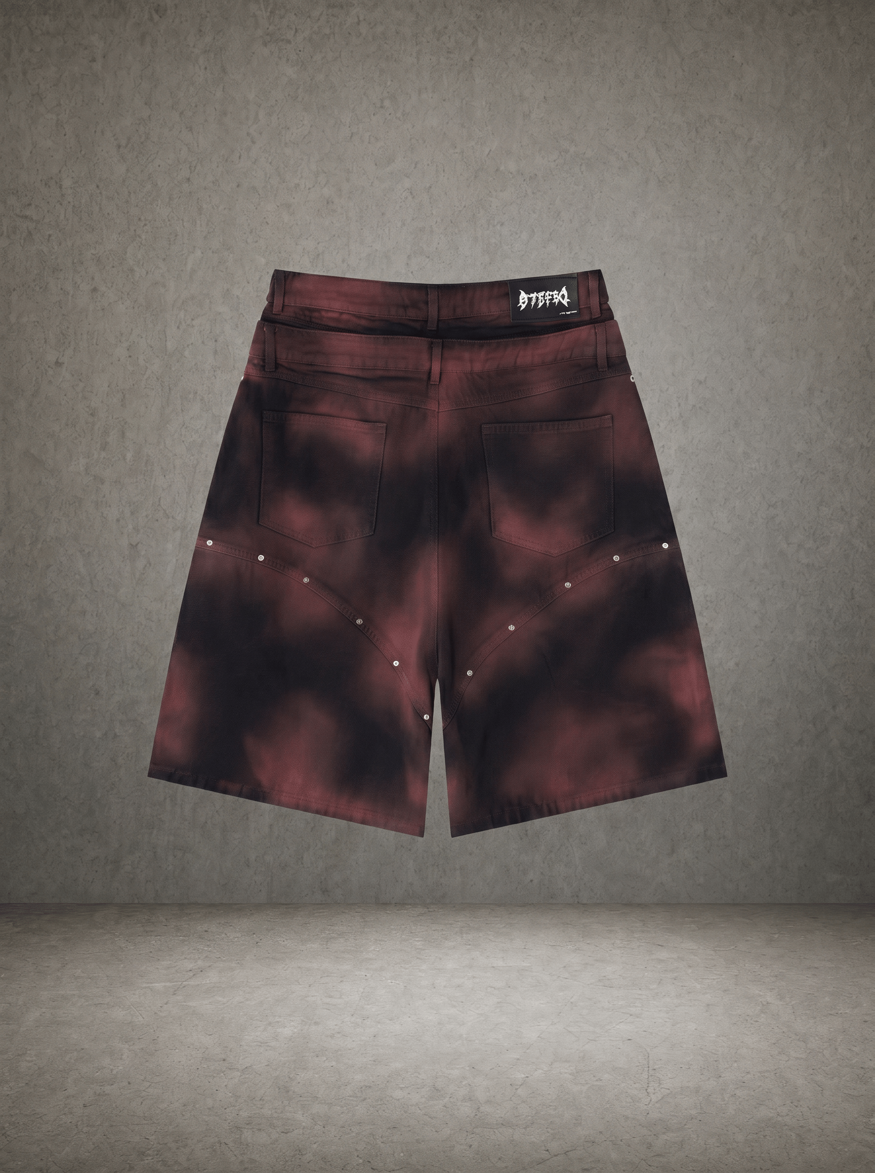 GOTHIC TRIBAL SPIKED DENIM SHORTS